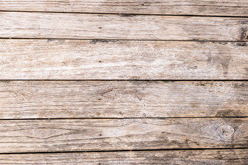 Obraz premium Wood plank light brown texture background.Surface eroded by time and old wood detail background.