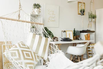 Fotobehang Boho White hammock with golden pillows  © Photographee.eu