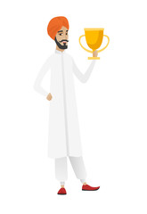 Hindu businessman holding a trophy.