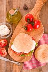 Puccia bread with mozzarella and tomato.