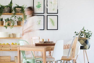 Woman in dining room