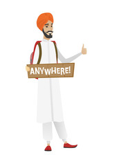 Young hindu traveler hitchhiking.