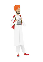 Hindu traveler man with backpack and binoculars.