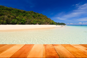 Fototapeta premium Wood plank with crystal clear sea. Koh Rok island, Krabi, Thailand.