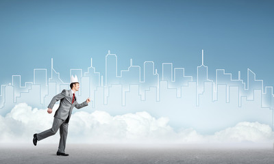 King businessman in elegant suit running and blue cityscape silhouette at background