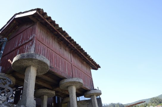 Typical red Galicia granary in Combarro, Galicia, Spain