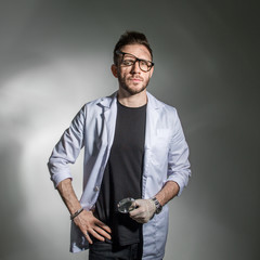 shaggy and dirty student after a dangerous experiment with the glasses