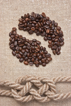coffee beans and rope knot on sack