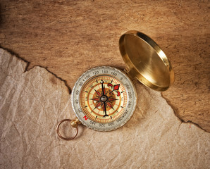 compass and a piece of old paper