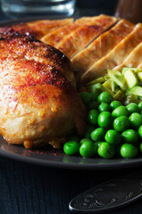 Fried chicken fillet with green peas