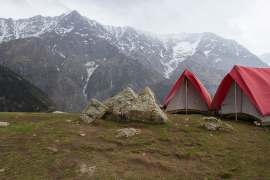 Camp of climbers on the way to the top. Glade in front of the tents. Waiting for good weather