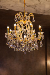 Beautiful chandelier. luxury expensive chandelier hanging under ceiling