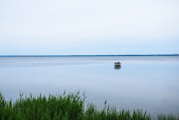 Alone small boat in calm water