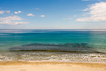Fototapeta na wymiar Seascape of Aegean sea, Greece. Beautiful turqoise sea and sky horizon background.