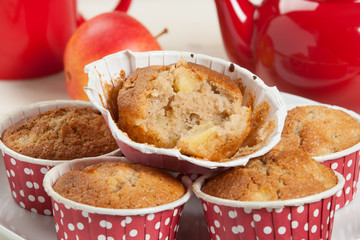 Homebaked Apple Muffins In Paper Cases. Red Teapot.