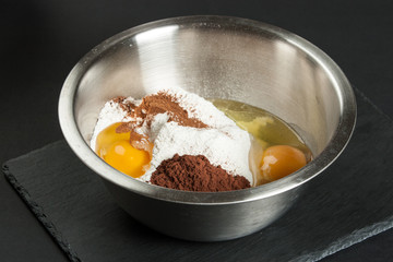 Cooking Process Of Brownies. Ingredients In Bowl.