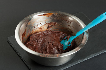 Cooking Process Of Brownies. Preparation Stage. Raw Dough In Bowl.