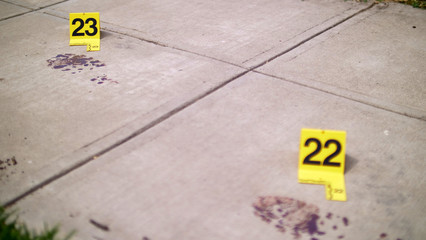 BLOODY FOOTPRINTS AT A CRIME SCENE