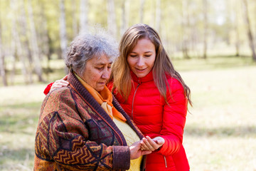 Fototapeta premium Happy elderly woman with her daughter