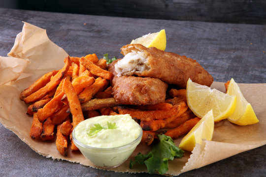 traditional British fish and chips on brown paper
