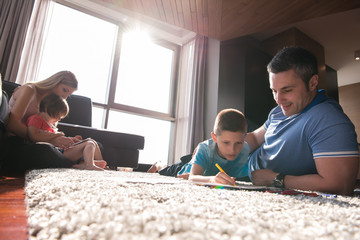 young couple spending time with kids