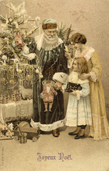 Father Christmas giving Xmas presents to a girl. Date: circa 1905