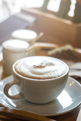 Soft focus on latte coffee cup, coffee for background - vintage effect process picture