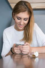 young woman using mobile phone