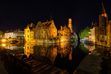 Fototapeta na wymiar The quay of the Rosary (Rozenhoedkaai) at night, Bruges, Belgium