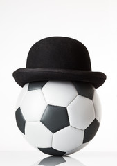 football wearing a bowler hat