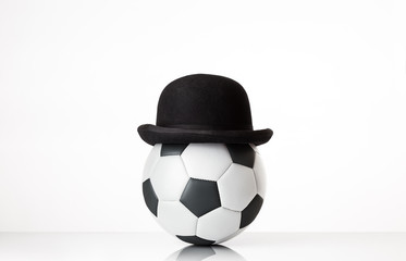 football wearing a bowler hat