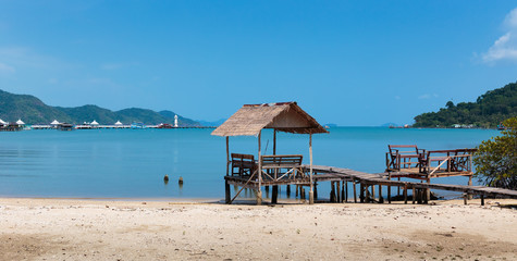 Wooden jetty on tropical beach