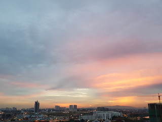 Pastel sunset sky over cityscape in Johor Bahru, Malaysia