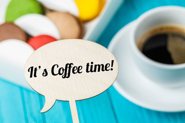 Inscription on topper ,macaroons ,coffee