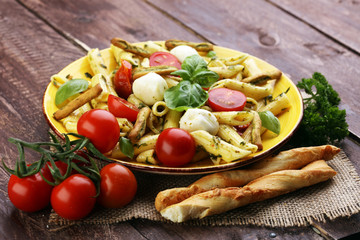 Traditional Italian penne pasta, fresh mozzarella, fresh tomato and sun dried tomato meal