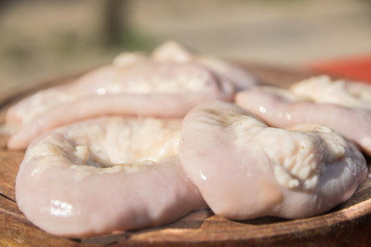 Raw Chinchulin, traditional South American dish