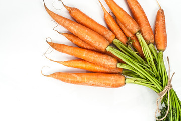 Red carrot on white background.