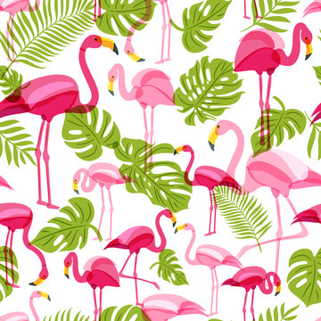 Vector seamless pattern with pink flamingo and green palm tree leaves. Summer tropical background. Trendy design for fabric and textile print.