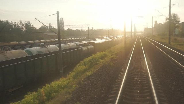 Railway for the Train A train passing through urban areas, moving railroad tracks