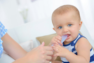 baby feeding spoon of porridge