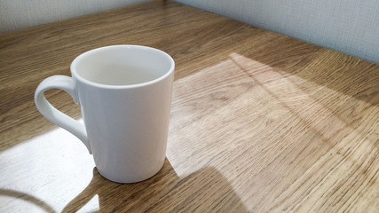 Coffee cup sitting on a corporate office desk