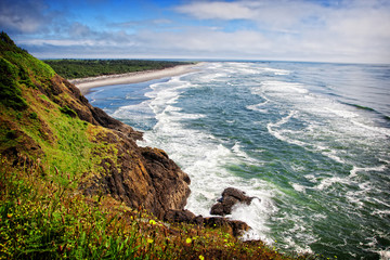 Waves on the Washington Coast - A scenic view of the pacific northwest coastline looking south from Cape Disappointment state park in Washington, USA.  