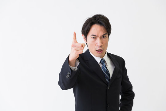 ミドル男性　ビジネス　怒る