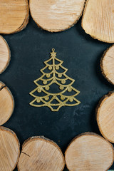 Colourful traditional Christmas decoration  on grunge wood texture of old weathered boards with copyspace