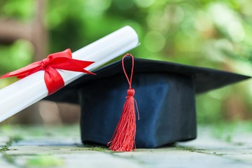 Graduation hat and diploma.