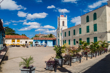 CAMAGUEY, CUBA - JAN 25, 2016: Colorful houses at San Juan de Dios square in Camaguey