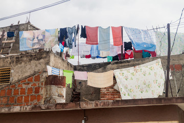 Laundry hanging on a dilipitated house in Bayamo, Cuba