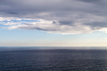 Fototapeta premium Sea and the cloudy sky