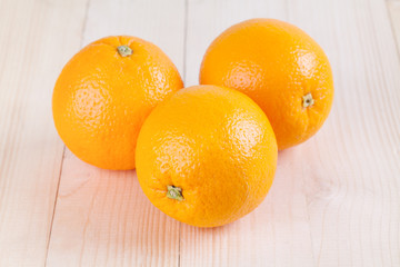 Fresh orange on wood table
