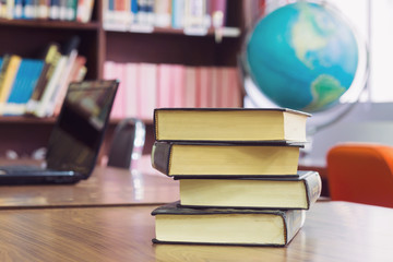 book on the table in library